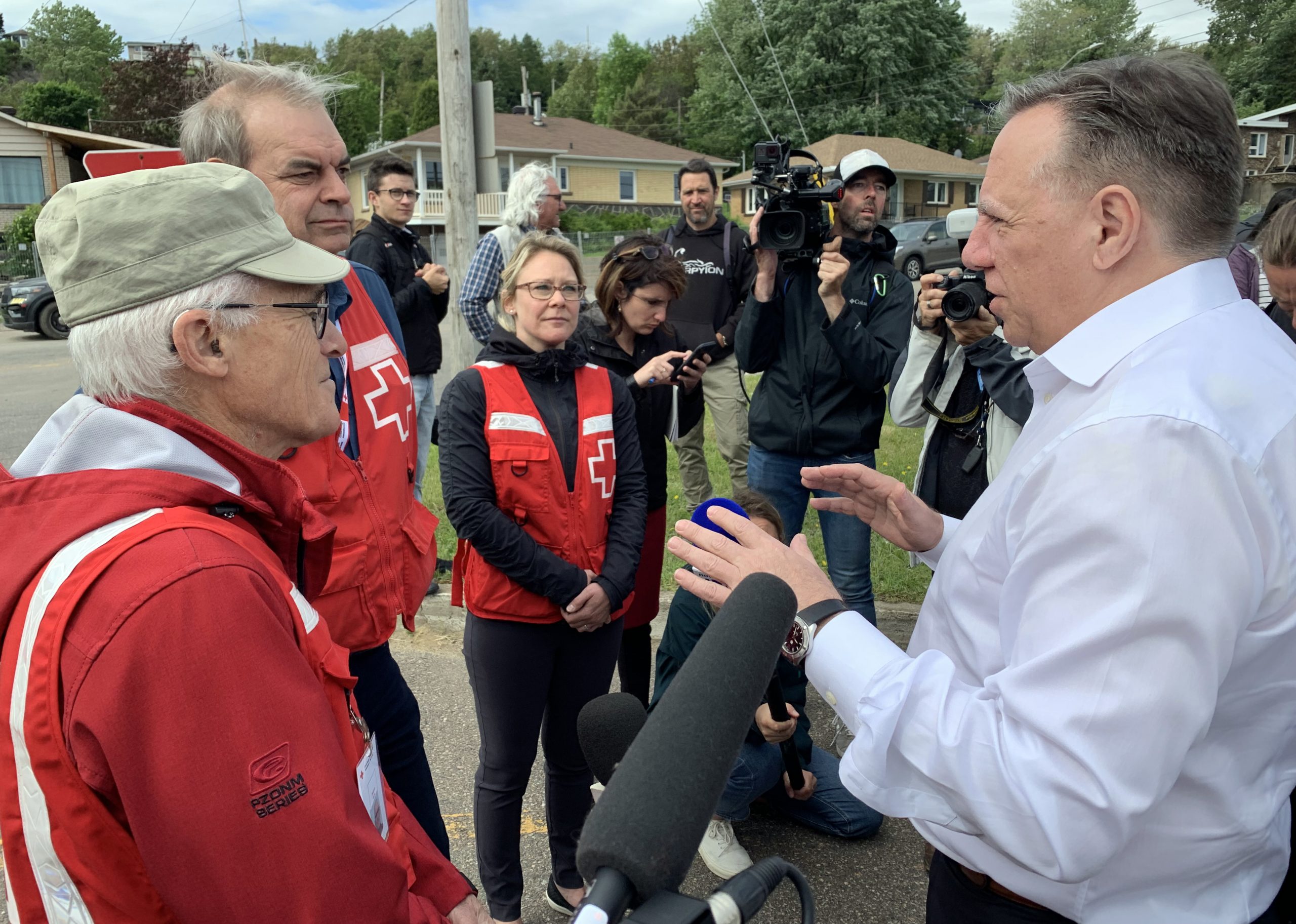 Premier François Legault visits Saguenay neighbourhood threatened by