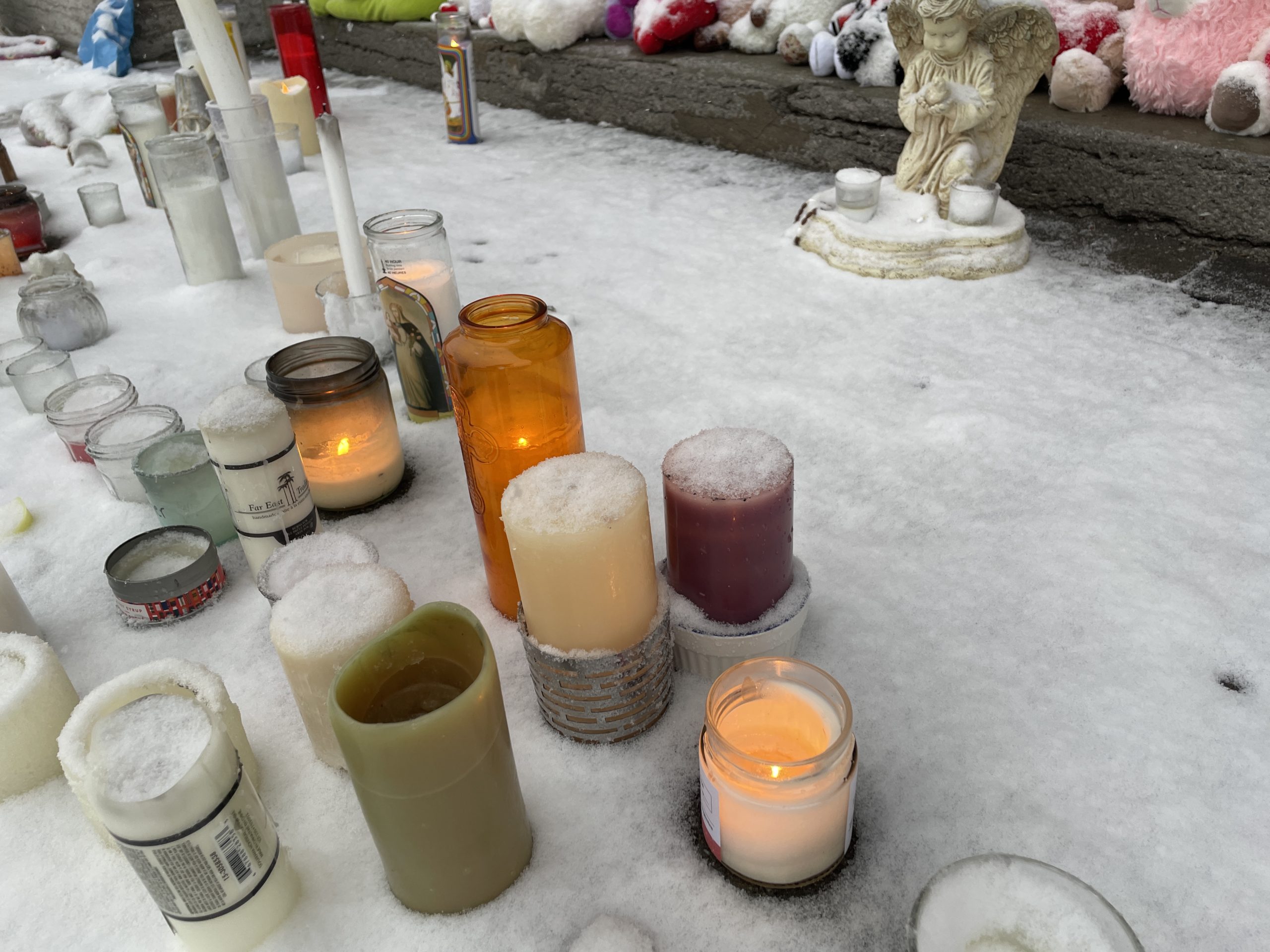 Laval's community leaving teddy bears, candles, and flowers for the victims of the Laval city bus crash 