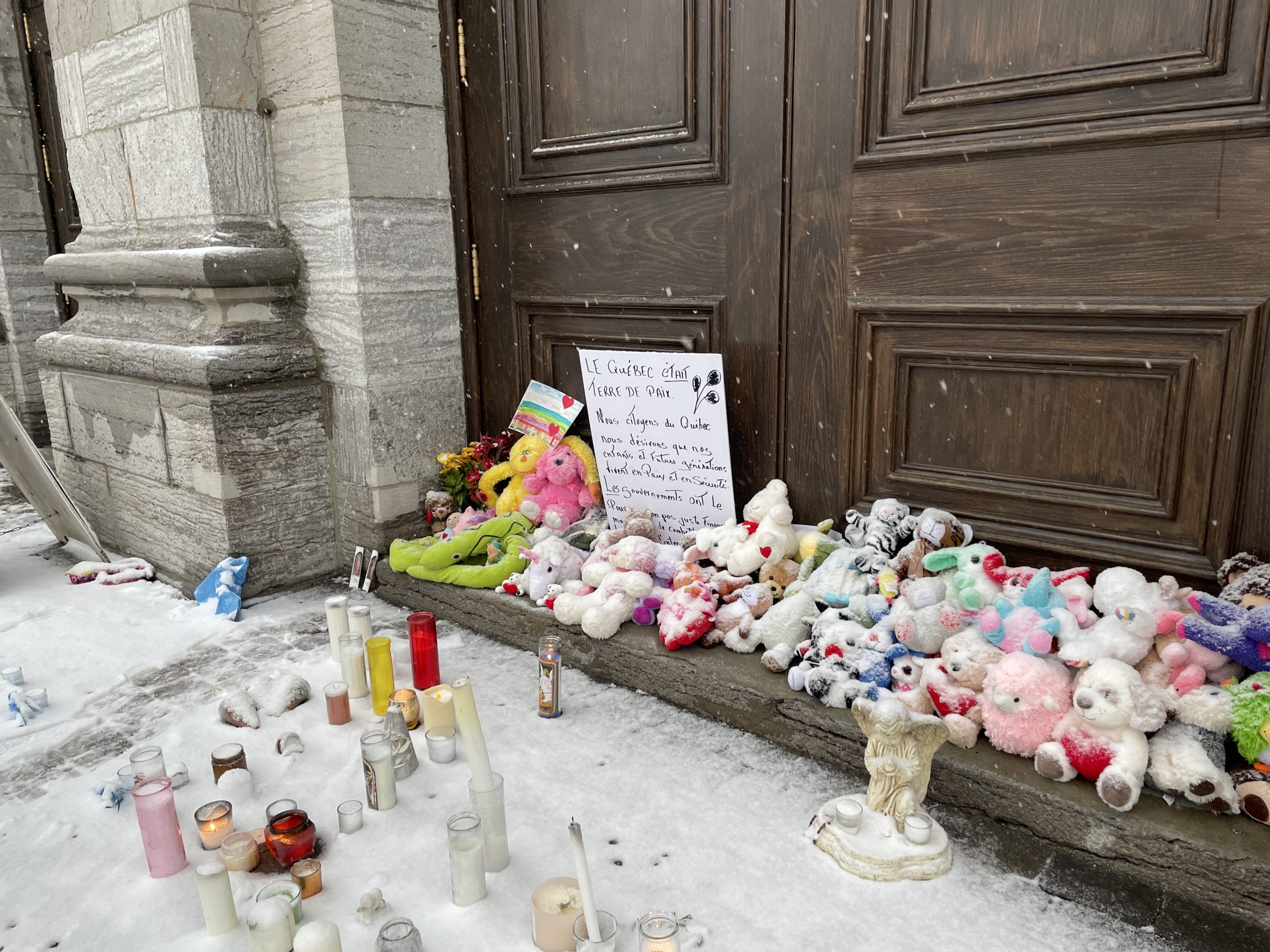 Laval's community leaving teddy bears, candles, and flowers for the victims of the Laval city bus crash 