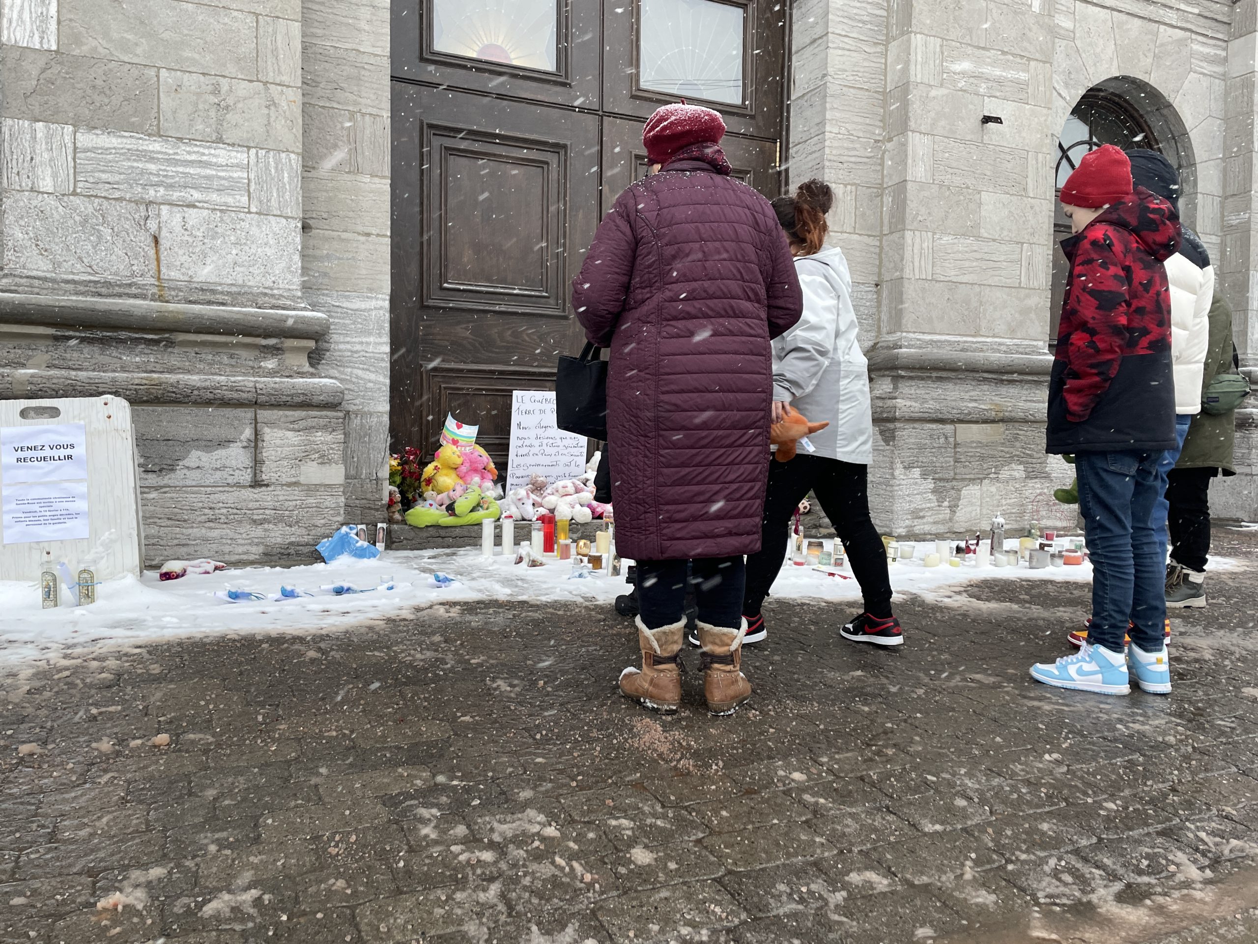 Laval's community leaving teddy bears, candles, and flowers for the victims of the Laval city bus crash 