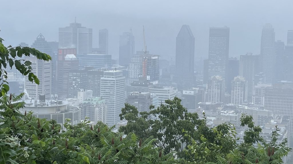 Montreal is engulfed in smoke from wildfires burning across the province on June 29, 2023.  A view from Mount Royal during the rain.  (Credit: Photo by Martin Daigle, CityNews)