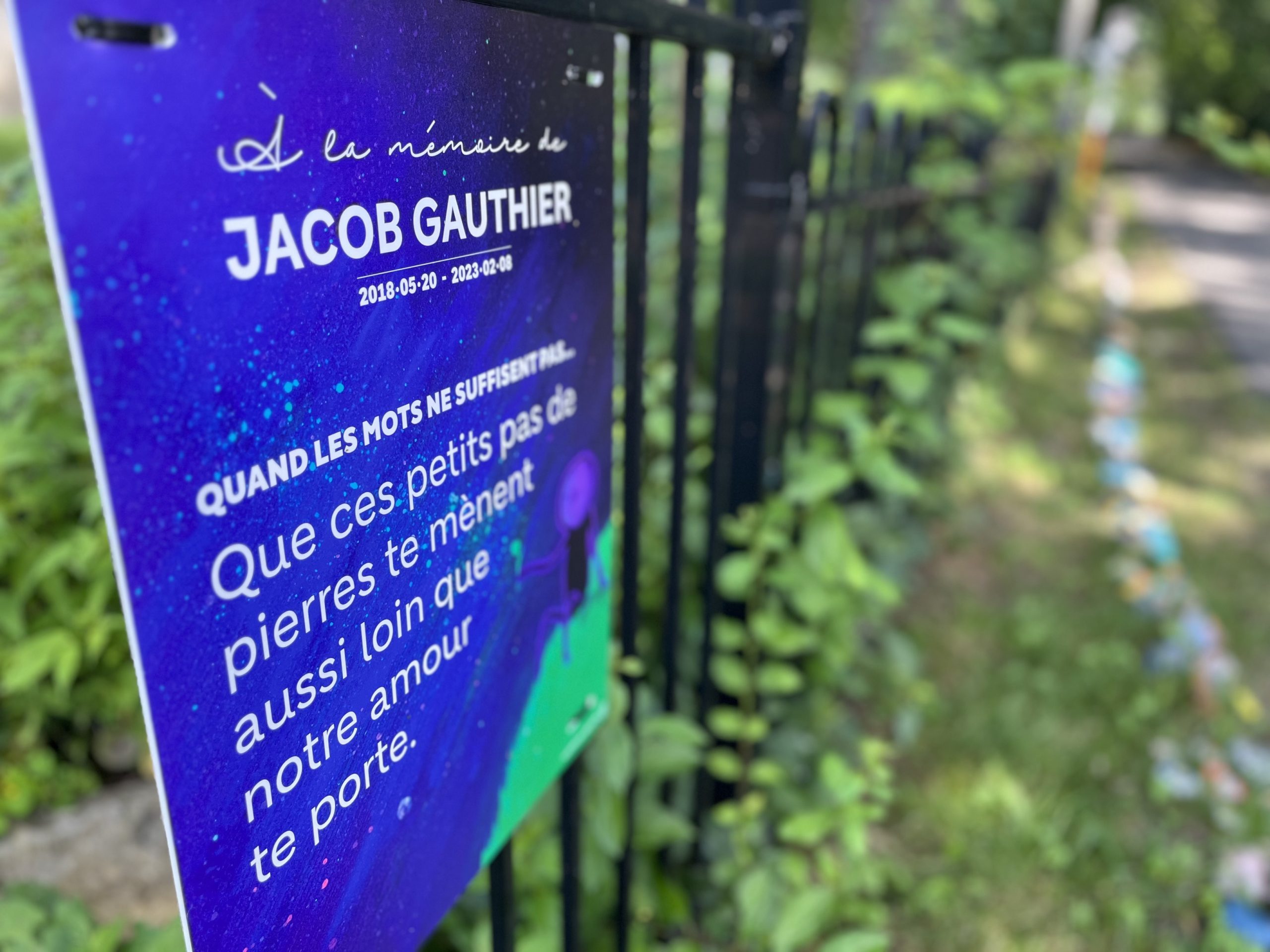 Laval daycare bus attack painted rocks memorial - for victim Jacob Gauthier - in Sainte-Rose,