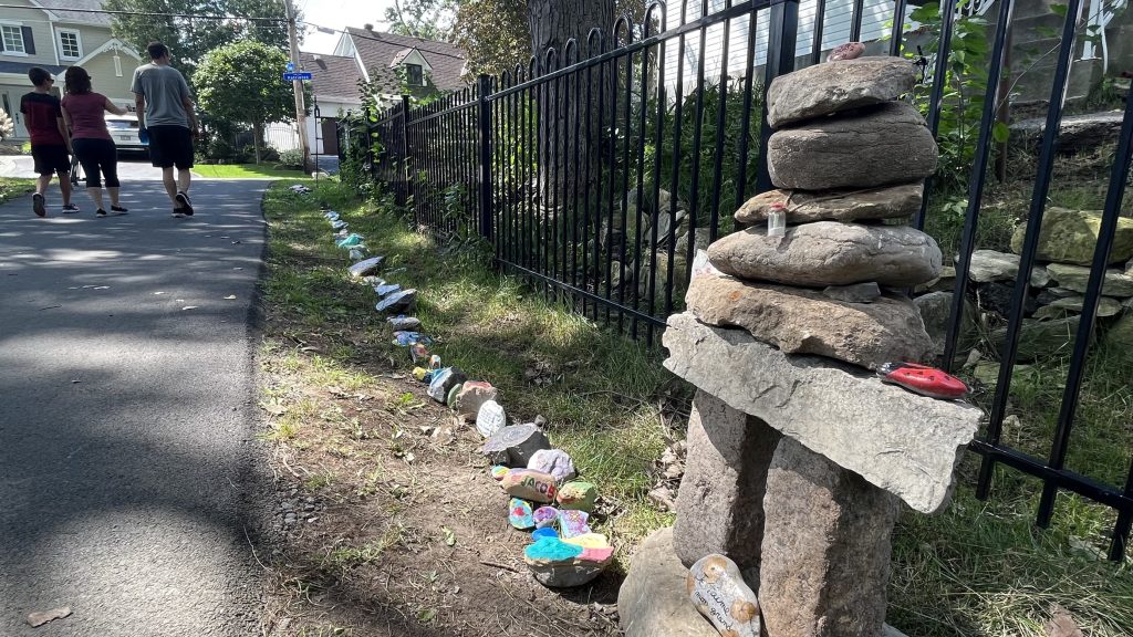 Laval daycare bus attack painted rocks memorial - for victim Jacob Gauthier - in Sainte-Rose,