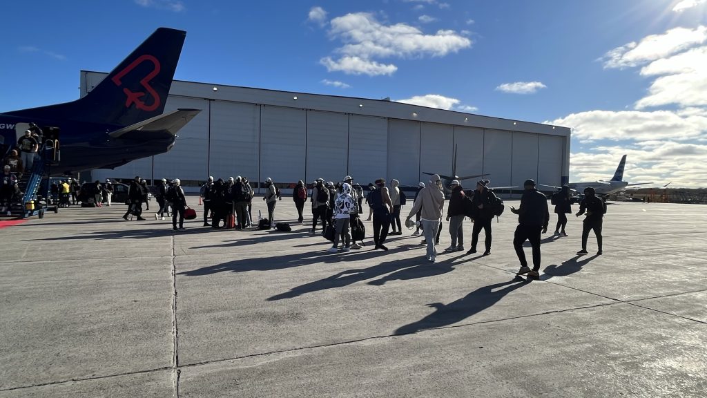 The Alouettes came back to Montreal on Monday morning, landing in Mirabel and carrying the Grey Cup off the plane in celebration.