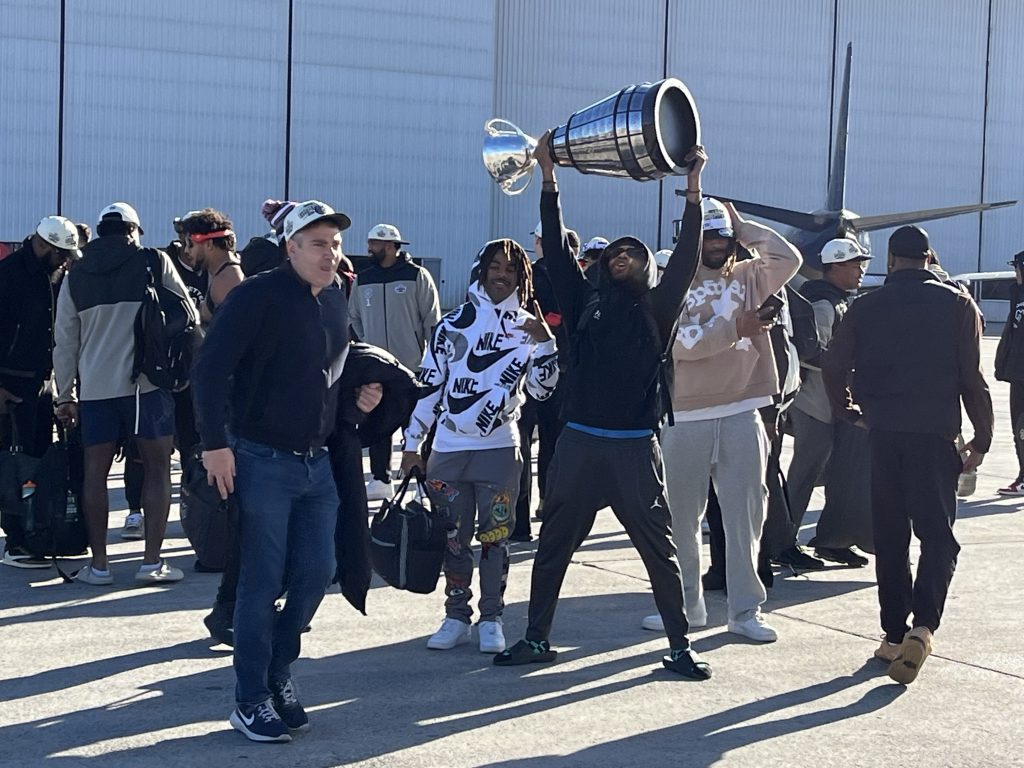 The Alouettes came back to Montreal on Monday morning, landing in Mirabel and carrying the Grey Cup off the plane in celebration.