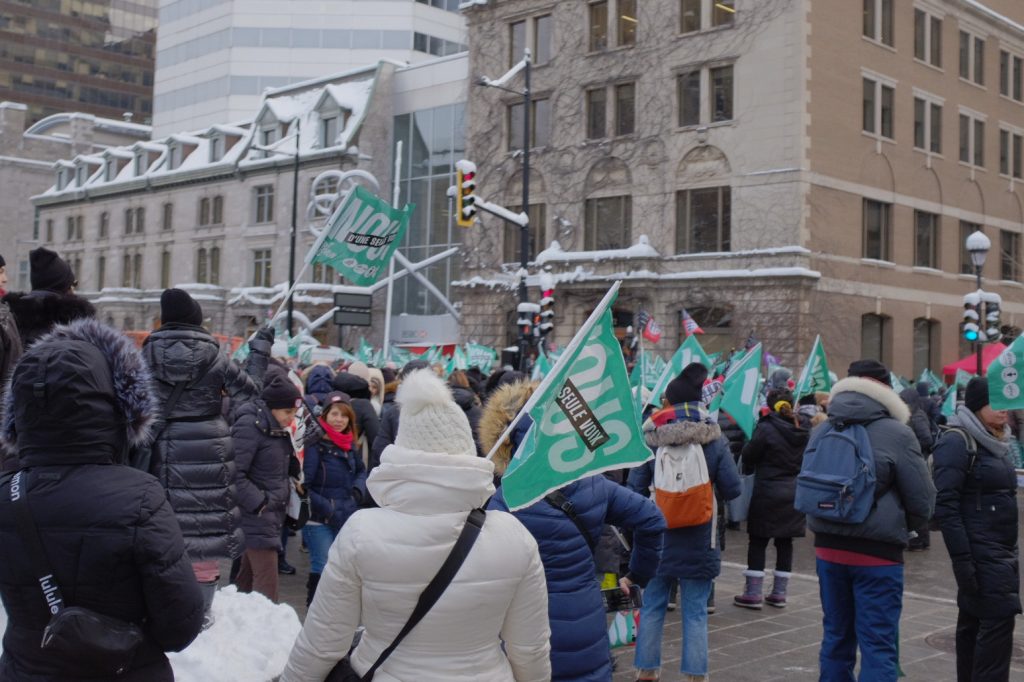 Common Front unions protest outside Premier Legault's Montreal office - Dec. 8 2023