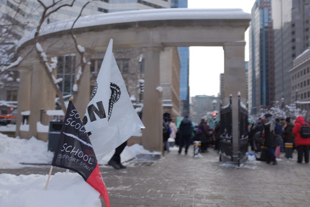 Common Front unions protest outside Premier Legault's Montreal office - Dec. 8 2023