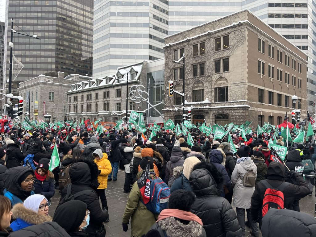 Common Front unions protest outside Premier Legault's Montreal office - Dec. 8 2023