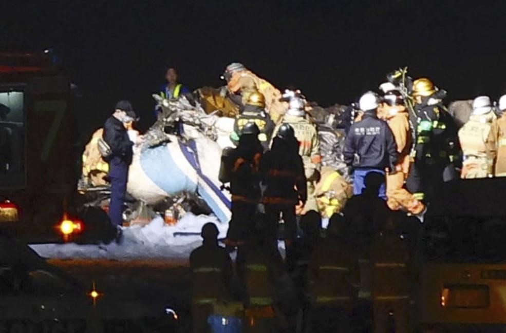 Planes collide and catch fire at Japan's busy Haneda airport