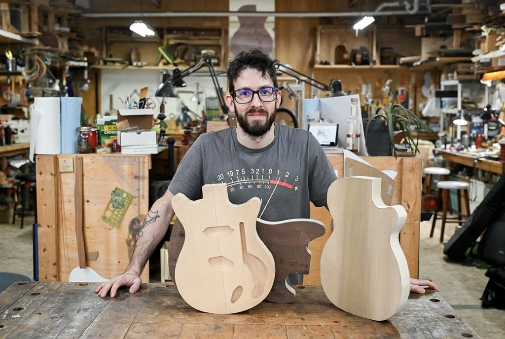 Montrealer turns reclaimed wood from barns and buildings into custom guitars