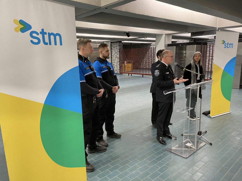 A press conference introducing the Safety Ambassadors at Place-des-Arts metro is seen