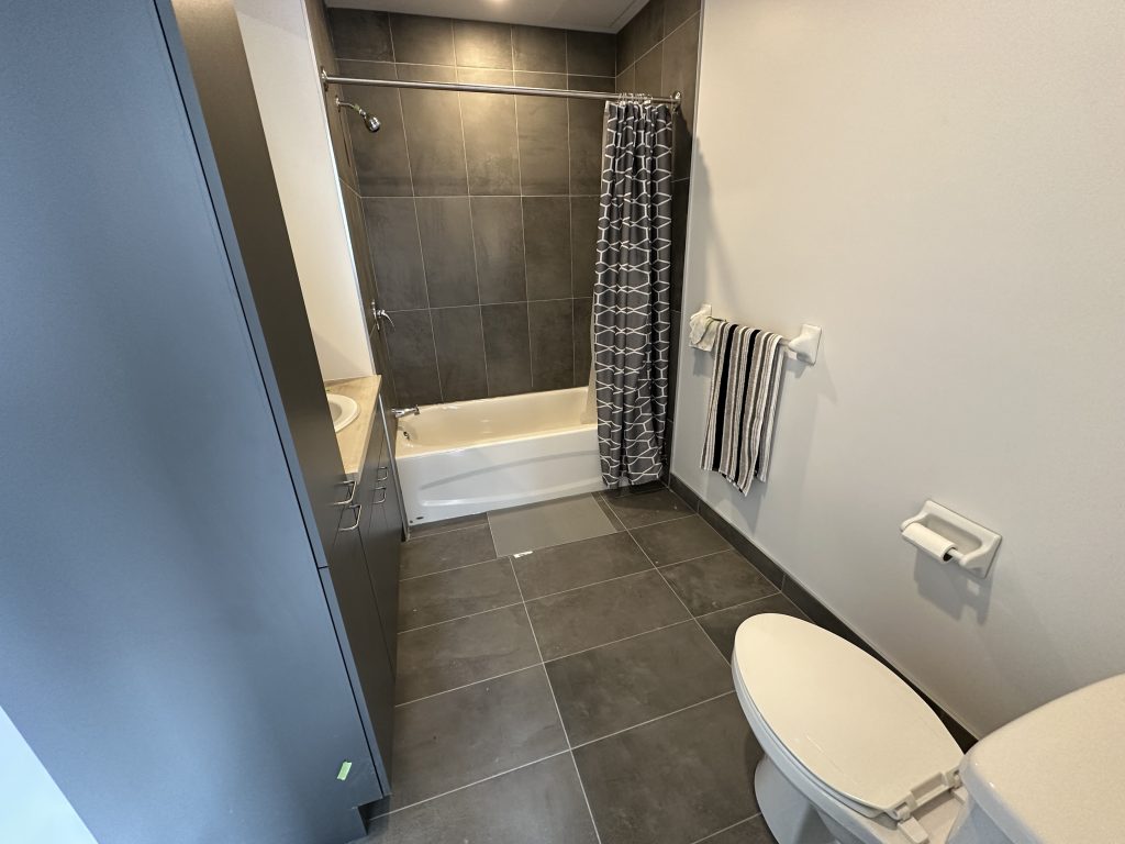 A bathroom is seen in a unit in ShelleyHouse