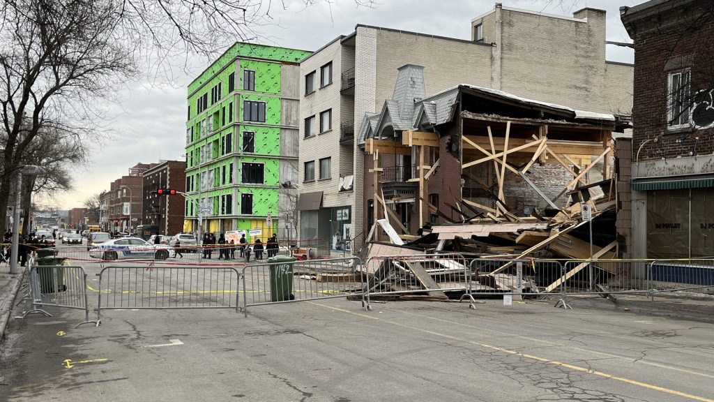 A building is seen completely collapsed in Outremont