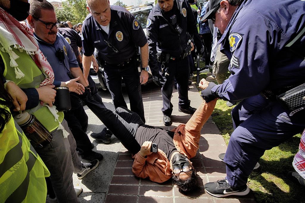 Arrests roil U.S. campuses ahead of graduation as protesters demand Israel ties be cut