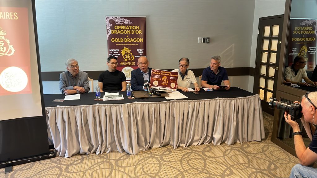 Chinatown community activists and CRARR are seen at a press conference in Montreal