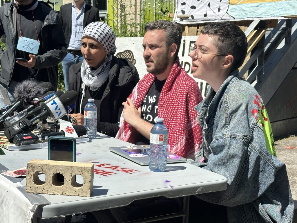 Activists hold a press conference at UQAM