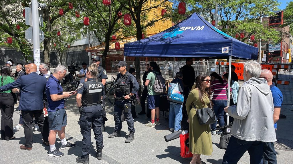 Montreal police (SPVM) set up a booth to meet with Chinatown residents