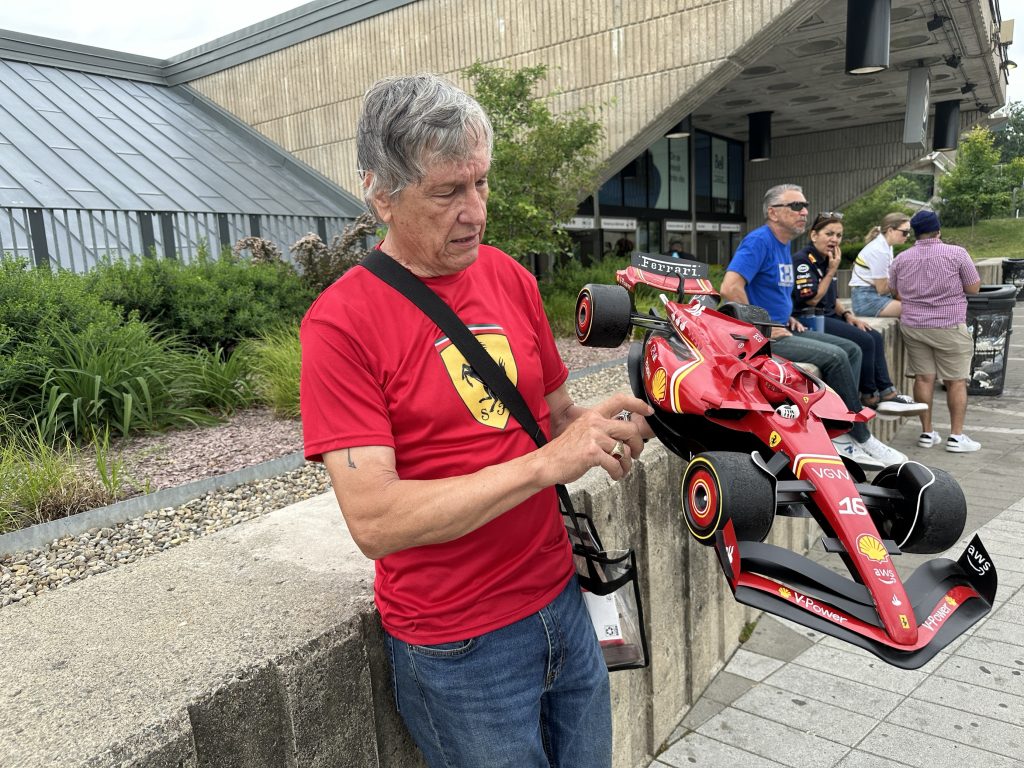Kim Reimer from Tallahassee, Florida, who showed off his hand-made Ferrari car hat.