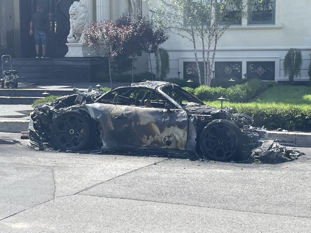 A torched car is seen 