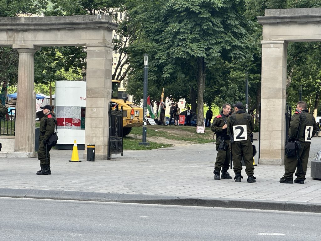 Montreal police outside McGill campus as the school dismantles the pro-Palestinian encampment