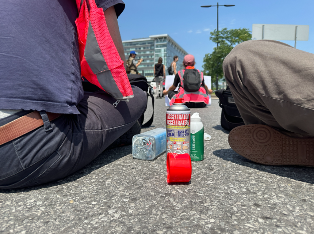 Protesters block the road at the Montreal-Pierre Elliott Trudeau International Airport