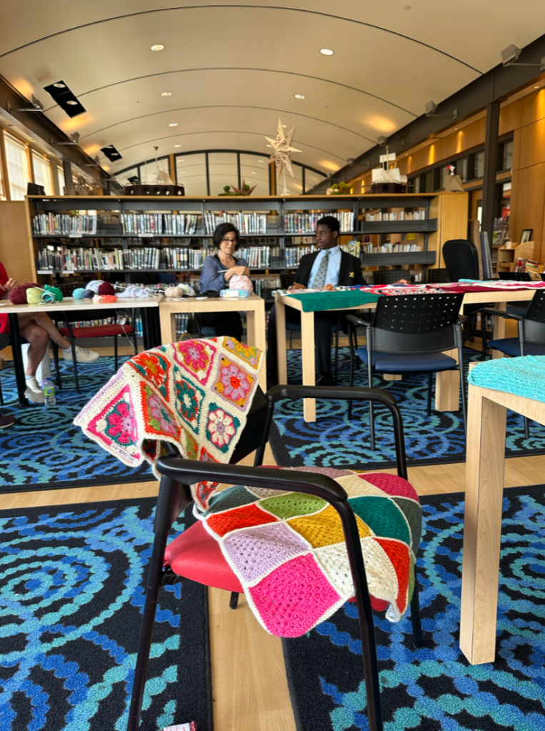 People are seen knitting at Selwyn House School in Montreal