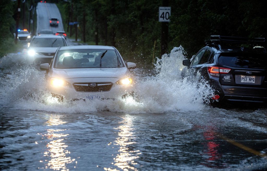 Highway 13 closure in Dorval after heavy rainfall causing 'big headache' for residents, businesses