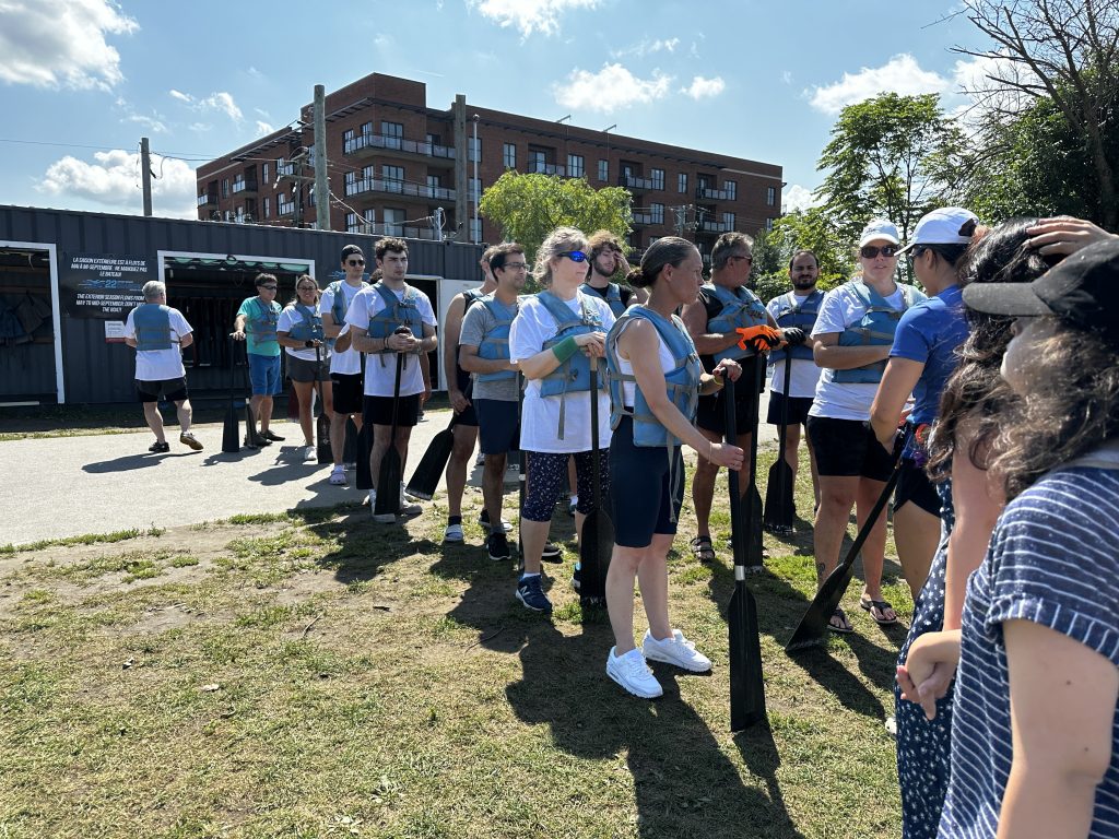 participants line up for the dragon boat race