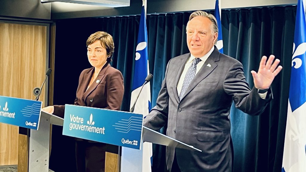 legault and Fréchette at a press conference