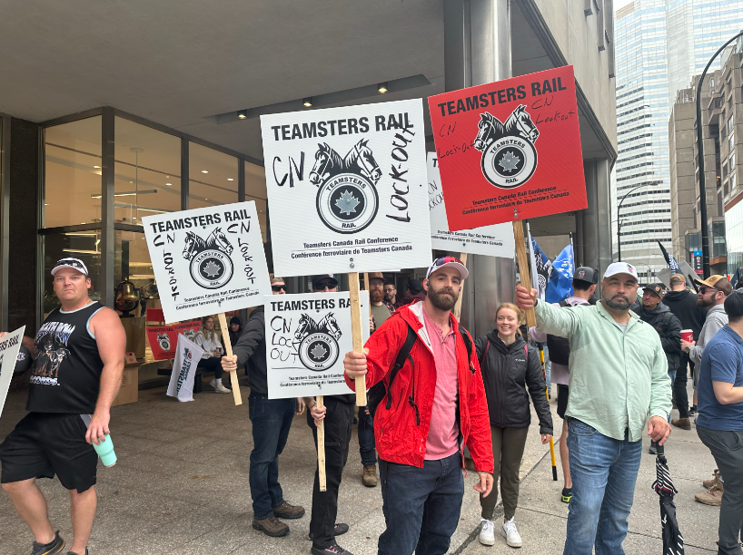 Rail workers strike outside CN headquarters