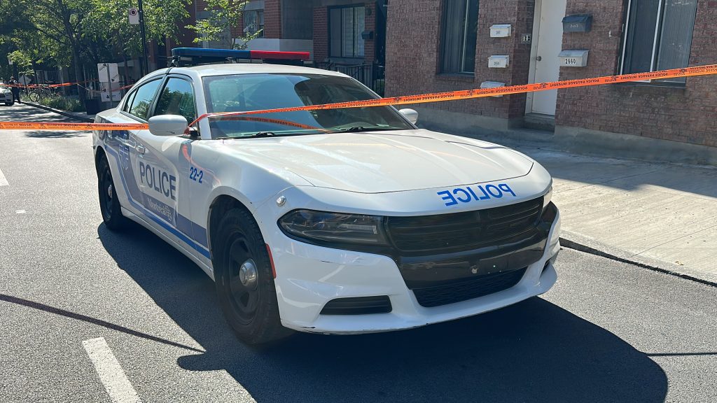 Montreal police (SPVM) on the scene after two bodies found in an apartment building on Sept. 11, 2024.