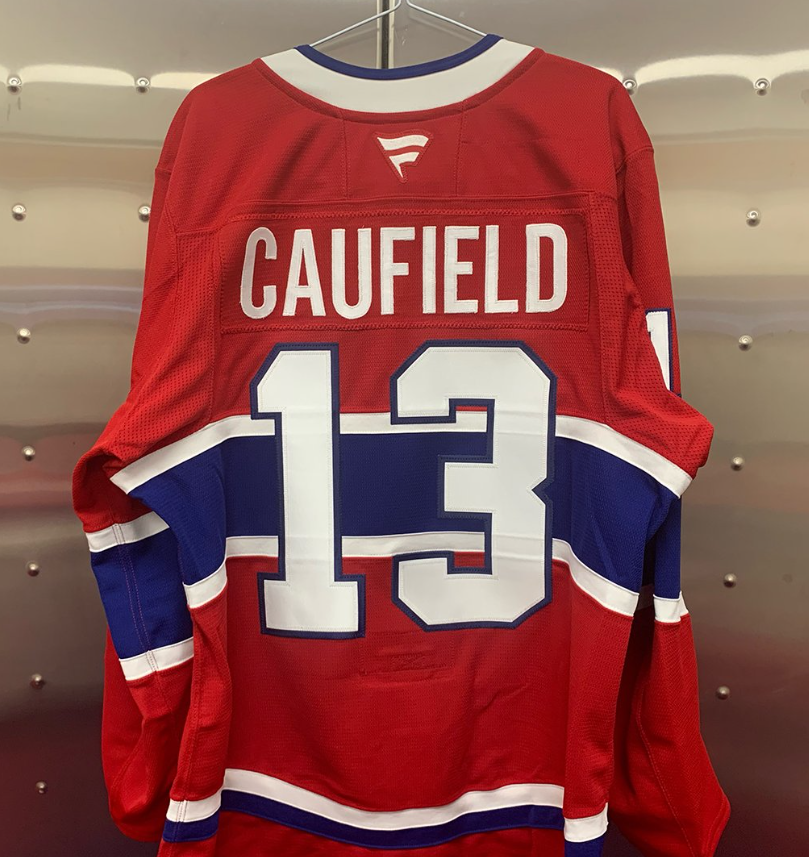 Montreal Canadiens jersey with number 13 and Caufield's name