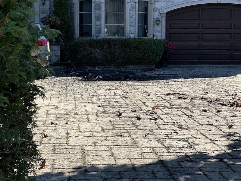 The aftermath of an arson attack on a vehicle outside a Dorval home on Oct. 17, 2024. (Alyssia Rubertucci, CityNews)