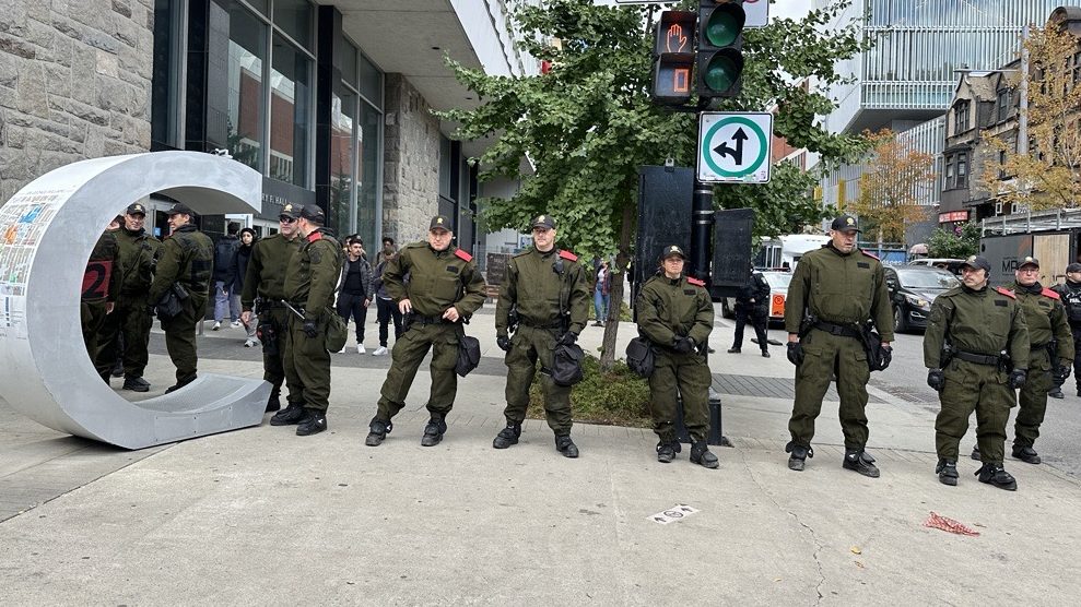 line of police officers in uniform