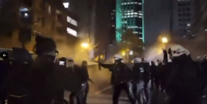 Anti-NATO protest in Montreal erupts in fires, smashed windows, arrests, say police