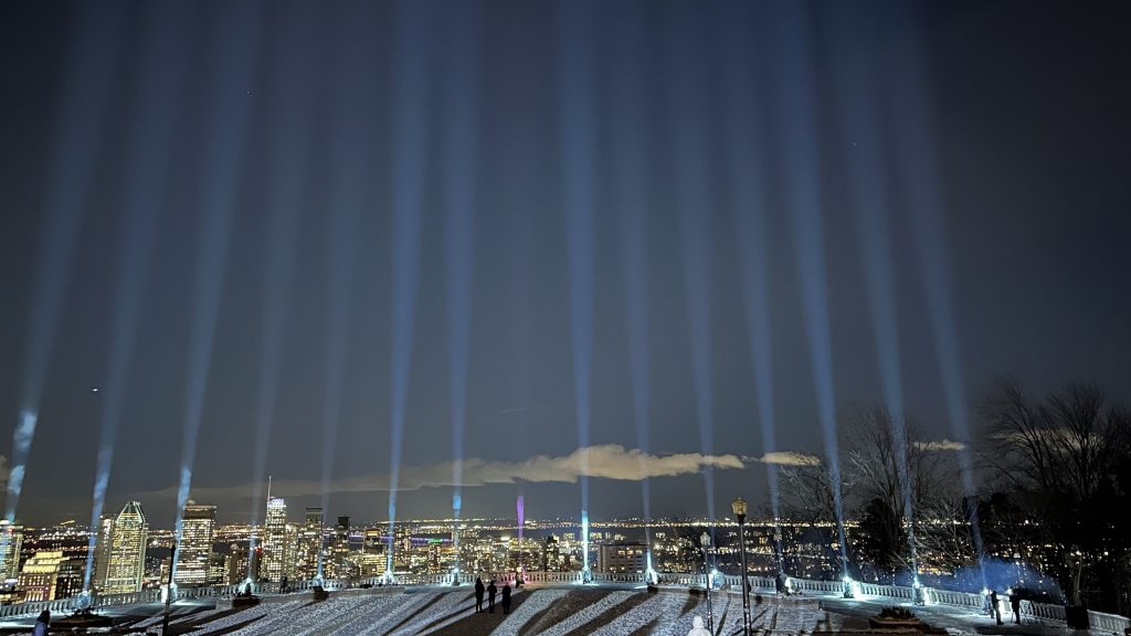 15 light beams illuminate the sky during annual ceremony for women killed at Polytechnique